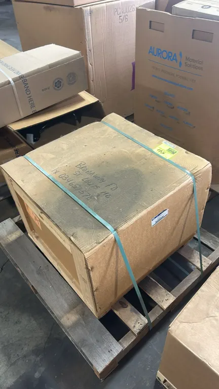 Ford OEM fuel tank assembly, part number 5C4Z-9002-A. Enclosed in banded crate packaging.