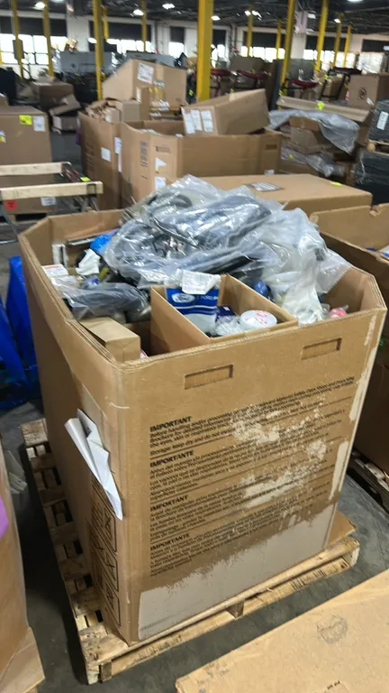 Gaylord container of assorted automotive parts and supplies. Includes high-temperature split loom tubing (CRT435 / Auveco 20536), ACDelco GM fuel/wate