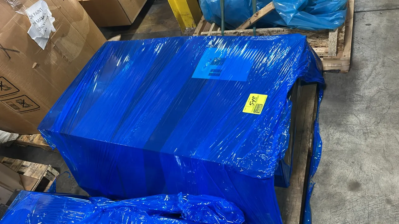 KEYper Systems electronic key management cabinet. Unit is shrink-wrapped and secured on a wooden pallet with product sheet attached.