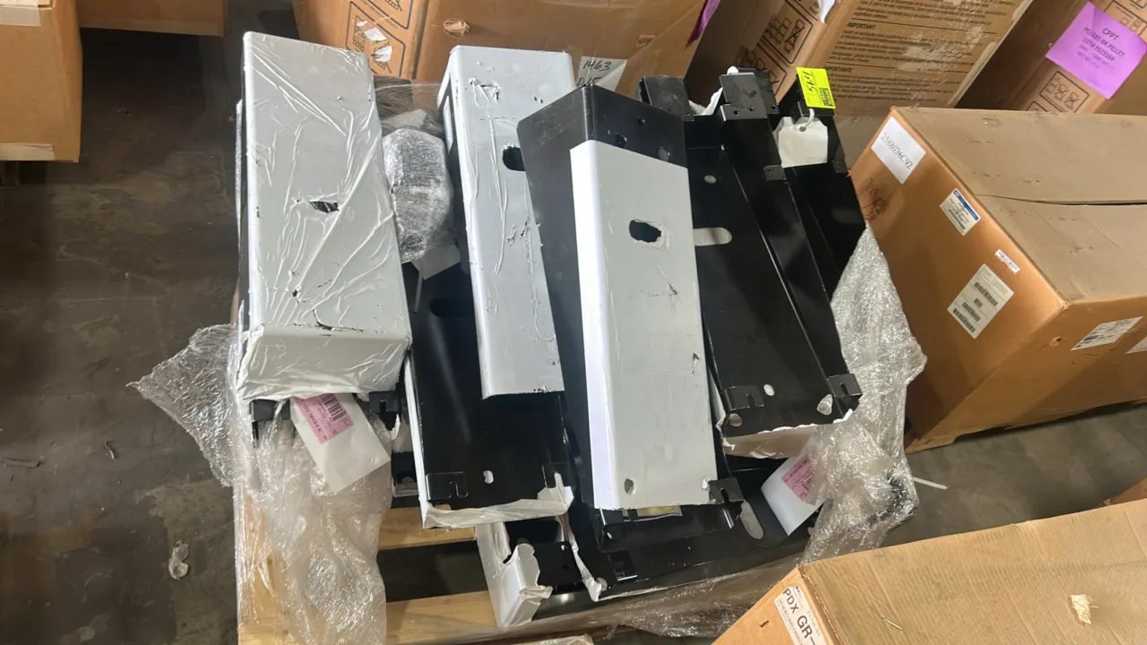 Ford LB5Z-78047A18-AC front support and console floor brackets. Features black-finished metal construction with pre-drilled mounting holes and protect