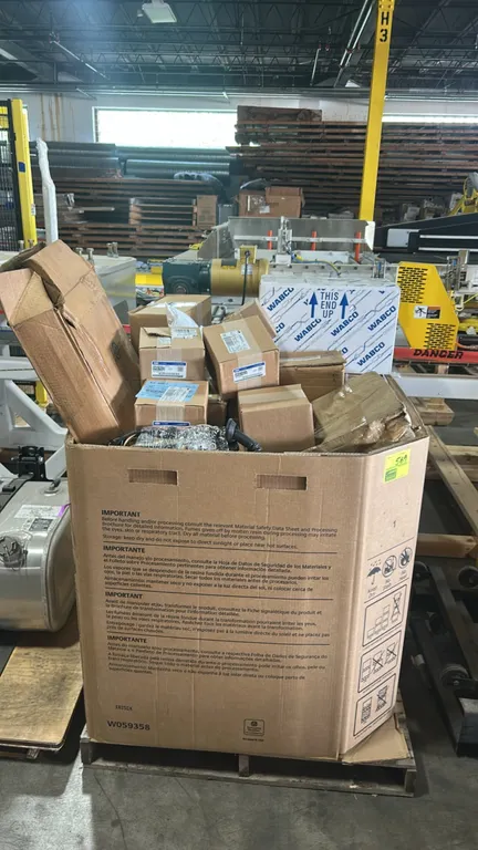 Gaylord pallet of automotive parts. Includes Ford OEM connector oil tubes (P/N: BL3Z-6A968-C), right turbocharger oil lines (P/N: FL3Z-9G441-B), autom