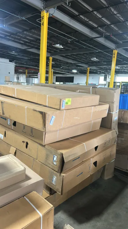 Pallet lot of genuine Ford automotive body panels and assemblies. Includes roof panel assembly (P/N: CK4Z-6150202-P), hood panel assembly (P/N: M2DZ-1