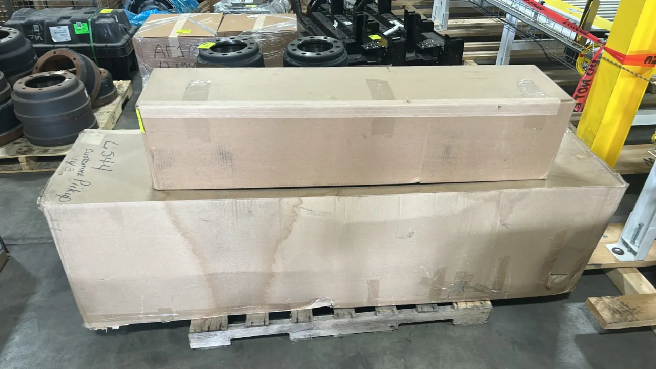 Ford OEM automotive parts lot. Includes running board/step assembly (part number HC3Z-16451-AB), automatic transmission oil cooler (part number BU9Z-7
