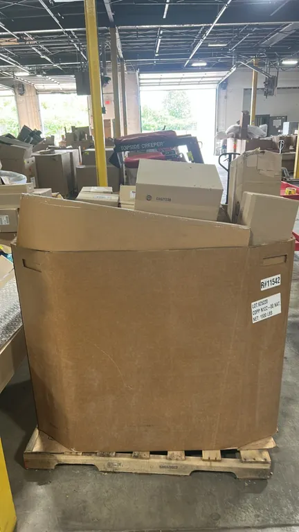 Assorted Ford OEM automotive parts in Gaylord container. Includes wiper arm and pivot assembly (P/N: LC4Z-17566-A), door mirror assembly (P/N: NZ6Z-17