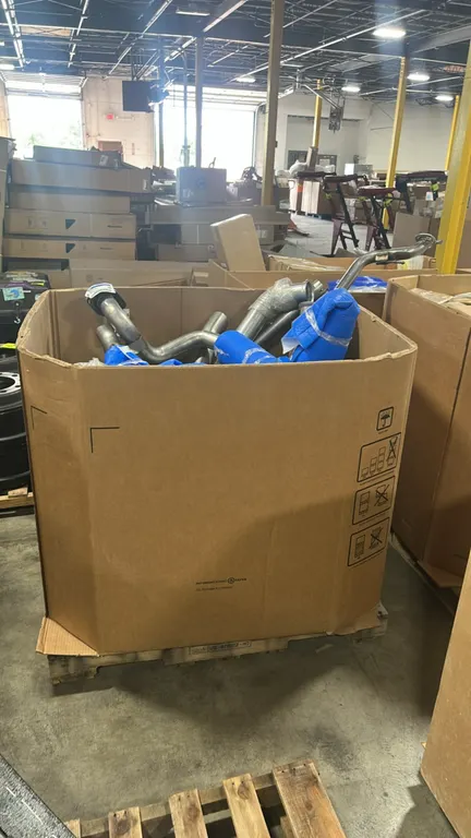 Ford OEM catalytic converter assemblies and exhaust piping. Includes catalytic converters (P/N BC3Z-5F250-D, JL3Z-5E212-N) and intermediate exhaust pi