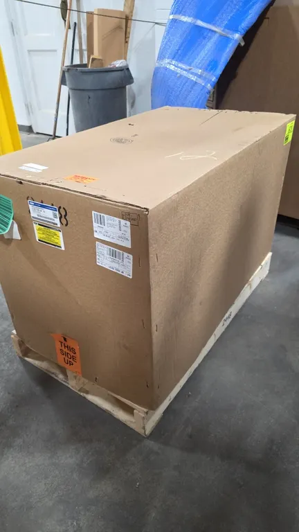 Ford LC3Z-7000-JB 10-speed transmission core. Features torque converter and factory transport crate packaging. Note: Offered as a core unit for rebuil