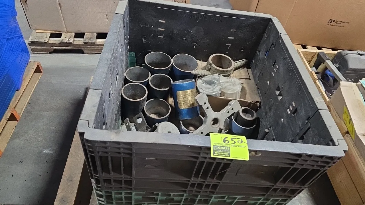 Kent-Moore assorted piston ring compressor sleeves and tooling components. Includes various cylindrical sleeves, adapters, and installation tools with