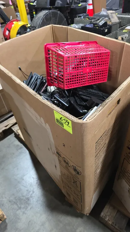 Assorted computer peripherals and electronics lot. Includes assorted keyboards, computer speakers, cables, and telephones including Poly conference un