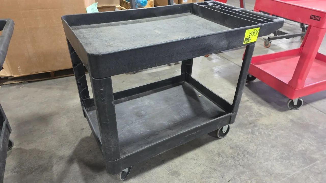 Poly 2-tier utility cart. Features molded push handle with integrated tool and beverage compartments and deep-lipped shelves. 24.5" x 36". Mounted on