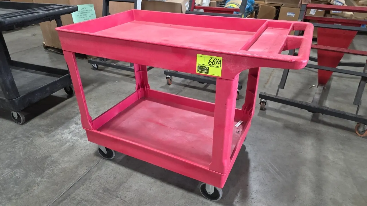 Uline poly 2-tier utility cart. Features red polyethylene construction, deep tub-style shelves, and molded push handle with integrated tool and cup co