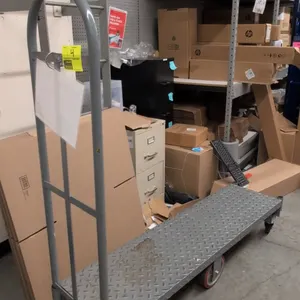 Metal 6-wheel U-boat platform cart. Features steel diamond tread plate deck and single tall removable tubular end handle. 5'L. Mounted on 6 wheels wit