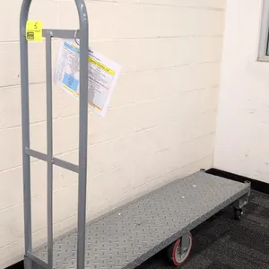 Metal 6-wheel U-boat platform cart. Features diamond plate steel deck and single removable tubular end handle. 5'L. Mounted on (2) rigid center wheels