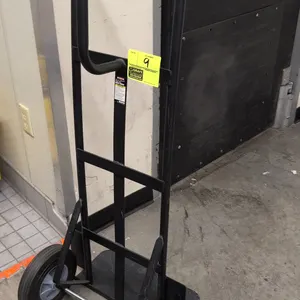 Franklin hand truck. Features a tubular steel frame with loop handle, solid toe plate, and 800 lb capacity. Mounted on (2) solid rubber tires. S/N: 37