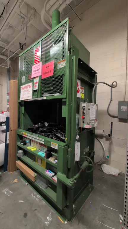 2008 PTR 1800HD vertical baler and compactor. Features right-hand swing door, manual wheel lock, key switch with key, and included baler wire. S/N: 08