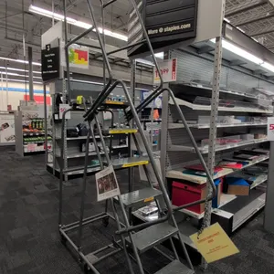 Metal rolling stock ladder. Features perforated slip-resistant treads, handrails, and upper safety guardrails. Dimensions: 24" x 56" x 101" (60"H top 
