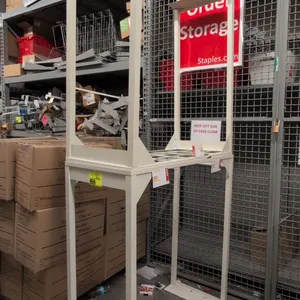 Metal merchandise racks. Features painted steel frame construction and wire grid shelving. Dimensions: 46" x 21" x 49".