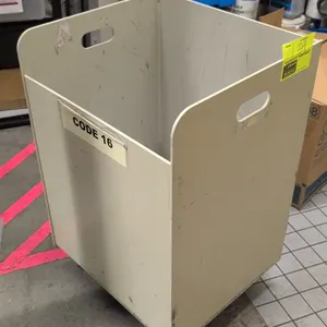 Poly portable container. Features open-top design with lower front access panel and cutout side handles. Off-white finish. 19" x 29"H. Mounted on cast