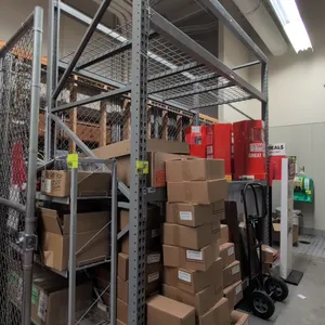 8'L section of Madix metal teardrop pallet racking. Features 3-1/2" crossbars and wire decks. Dimensions: 4'W x 10'H. Contents and hand truck not incl