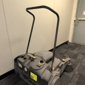 Windsor Radius 280X walk-behind commercial sweeper. Features adjustable side broom, main broom assembly, internal filter system, and Discover battery.