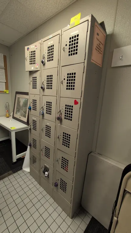 Metal 6-compartment locker units. Features perforated ventilated metal doors and padlock hasps. Dimensions: 1'W x 1'D x 6-1/2'H each. Padlocks and con