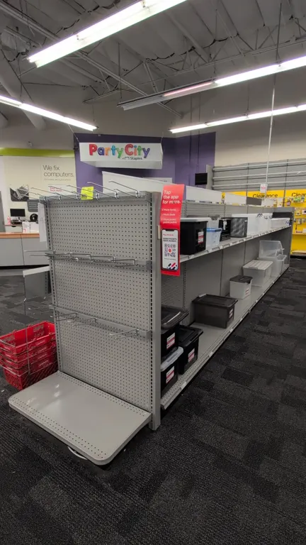 43'L of Madix gondola shelving. 60"H uprights with 18"/18" base shelves. Features gray finish, pegboard backing, and adjustable metal shelving. Conten