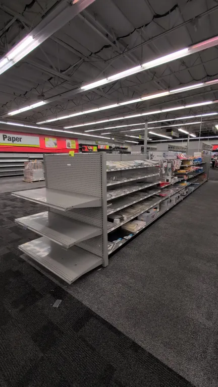 72'L of Madix gondola shelving. 60"H uprights with 22"/22" base shelves. Features gray finish, pegboard backing, and adjustable metal shelves. Content