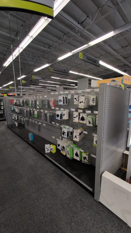 35'L of Madix gondola shelving. 60"H uprights with 18"/18" base shelves. Features gray finish and pegboard backing. Contents not included. Note: Sold