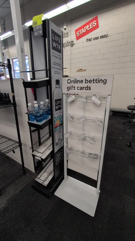 Metal retail merchandise display racks. Includes (1) 20"x63"H 4-tier portable merchandise rack with side graphic panels and shelf rails, and (1) 17"x4