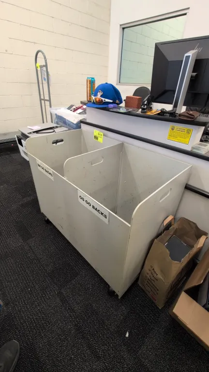 Poly portable 2-compartment container bins. Features polyethylene construction, dual compartments with center divider, and integrated cut-out handles.