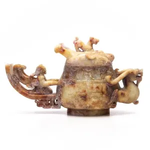 CHINESE ARCHAISTIC CARVED HARDSTONE GUANG VESSEL