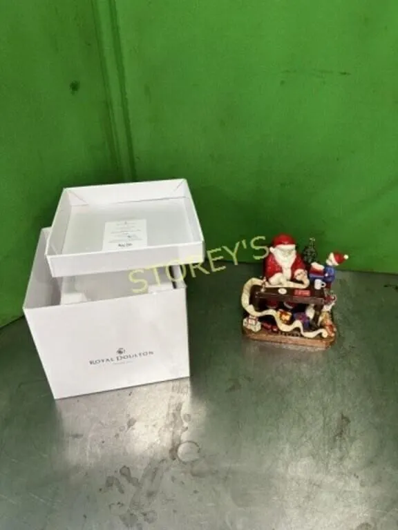 Signed Royal Doulton Christmas Figurine