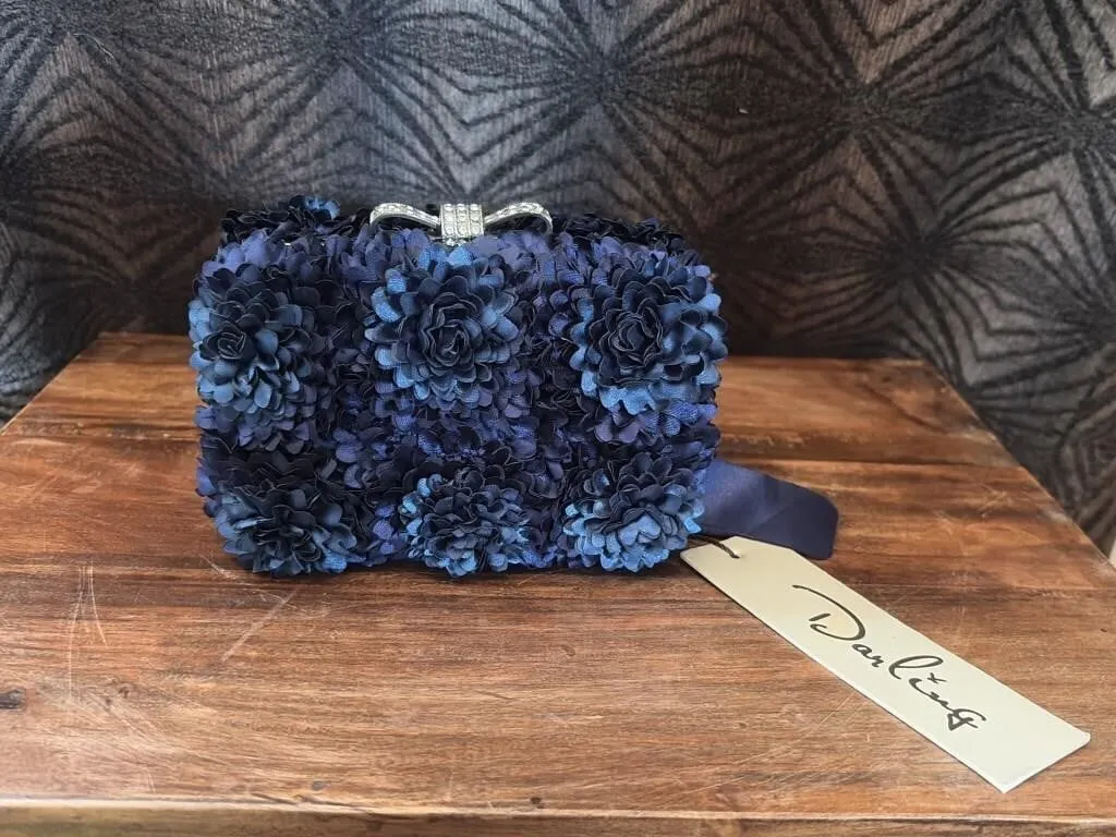 Darling 3D floral petal clutch
