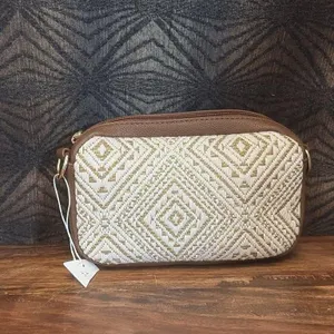 Brown and cream patterned raffia crossbody bag