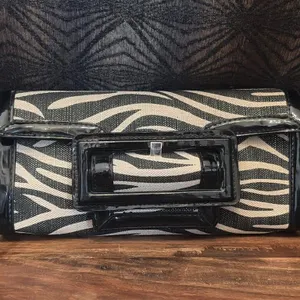 Black-and-cream zebra-print fabric clutch