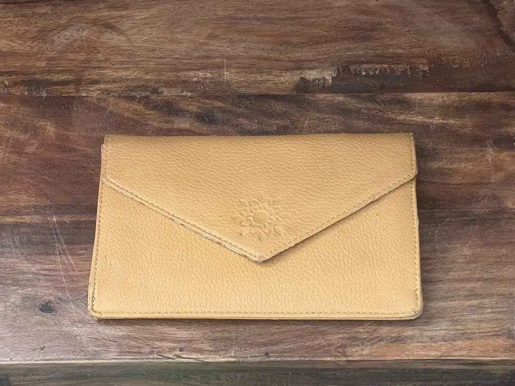 Mustard-yellow leather envelope wallet