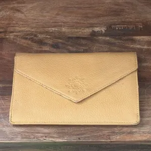 Mustard-yellow leather envelope wallet