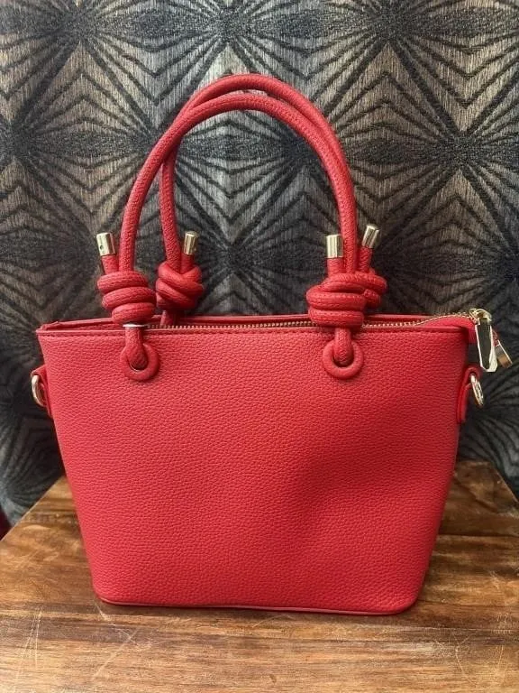 Red compact handbag