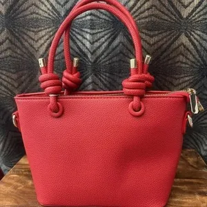 Red compact handbag