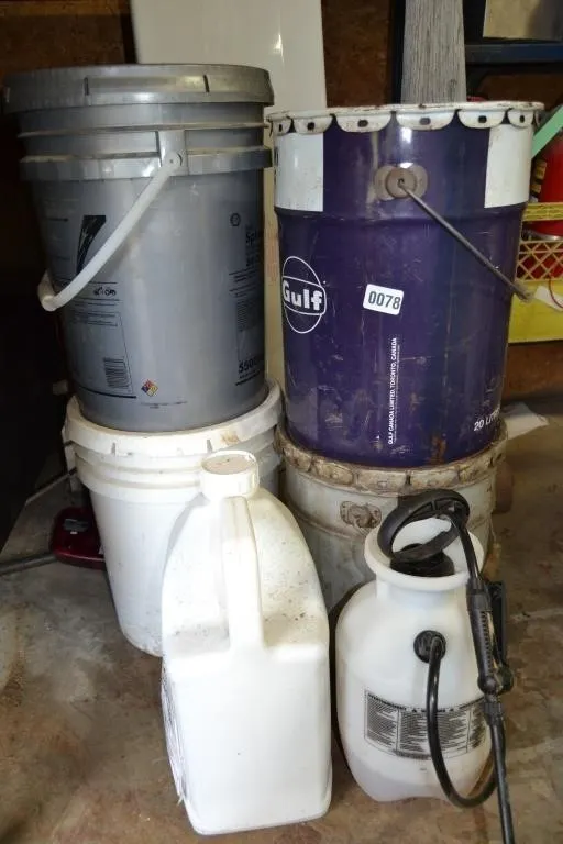 4, 5 gallon cans of oil