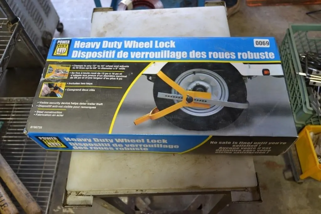 Unused heavy duty wheel lock kit in box