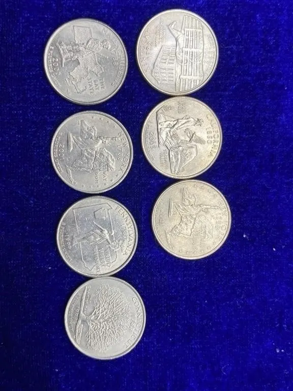 Lot of 7 US State Quarters