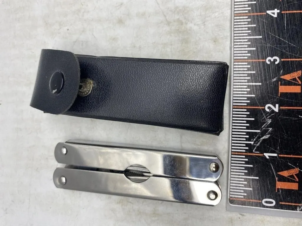 Multi-tool pliers with sheath