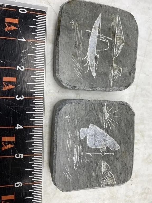 Pair of carved soapstone plaques, sailboat/bird