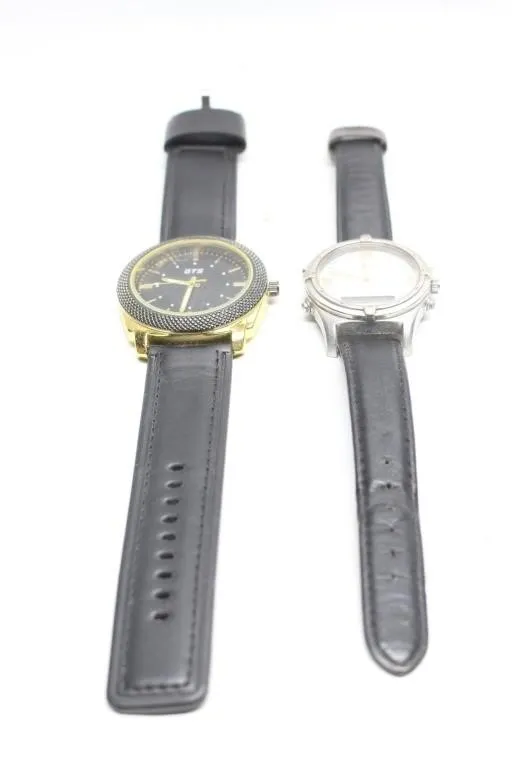 Three wristwatches: GTS, Timex Indiglo, and analog