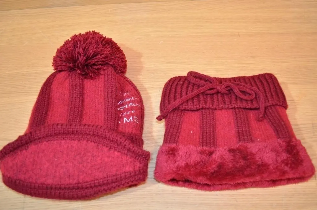 Matching red knit winter hat with a pom-pom and a