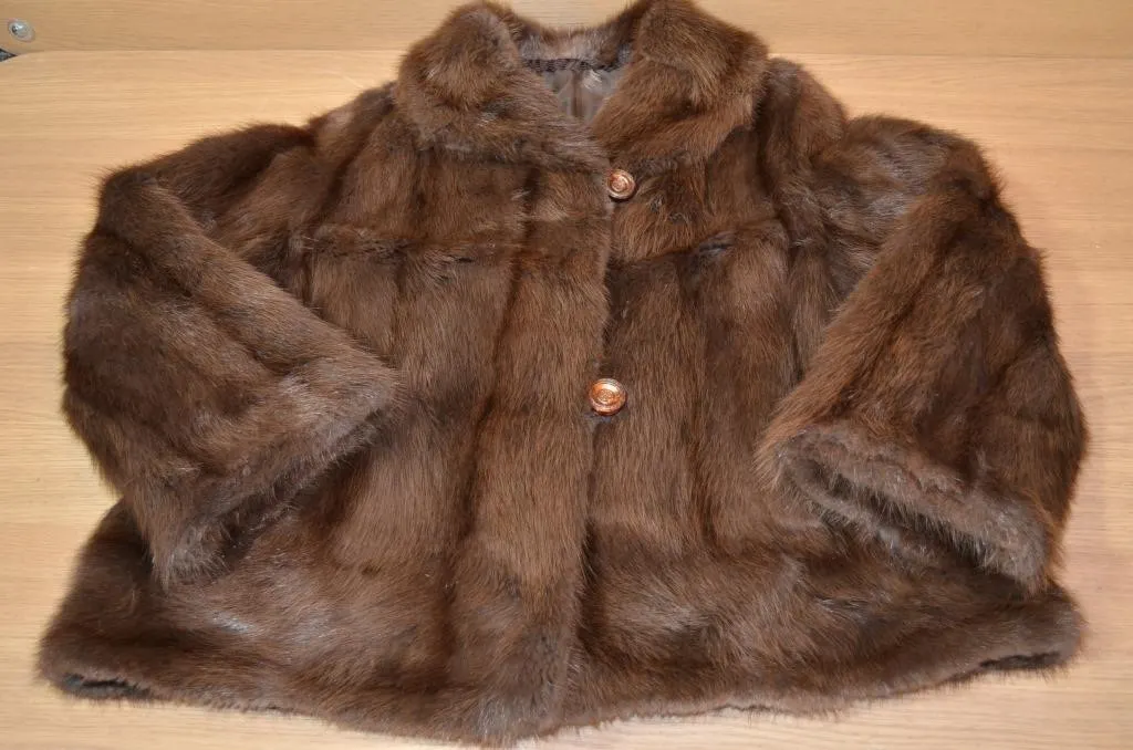 Vintage brown fur Mink jacket featuring a classic