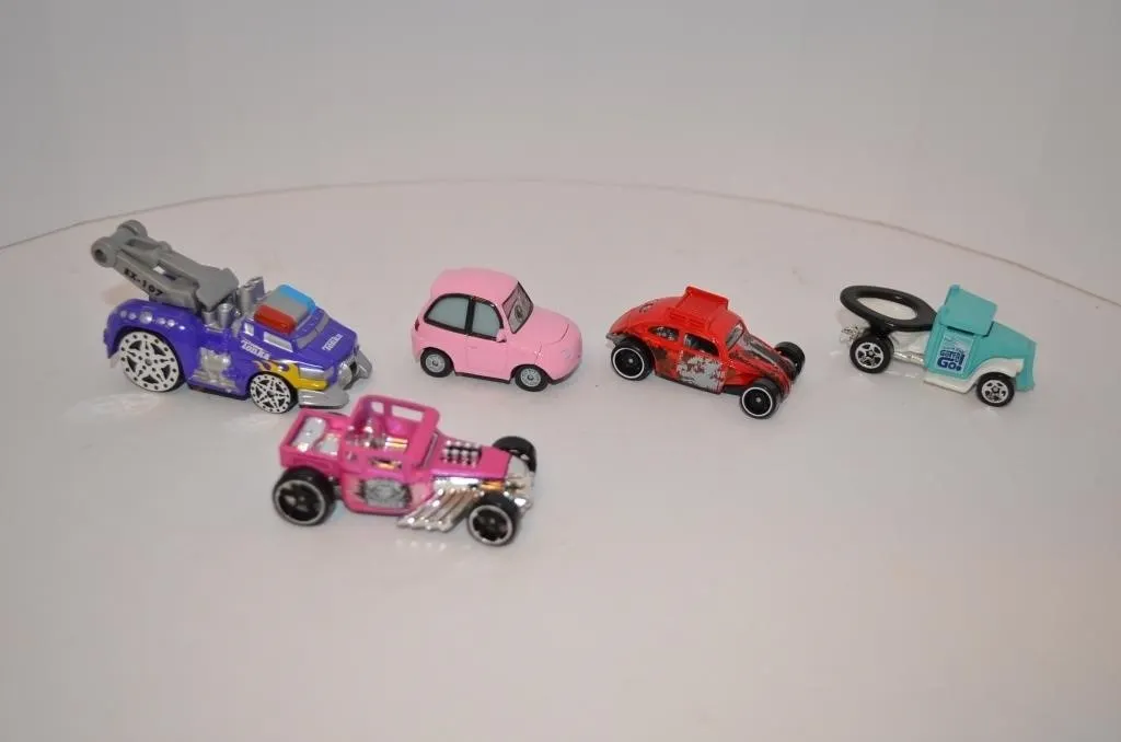 Collection of five whimsical, stylized diecast and