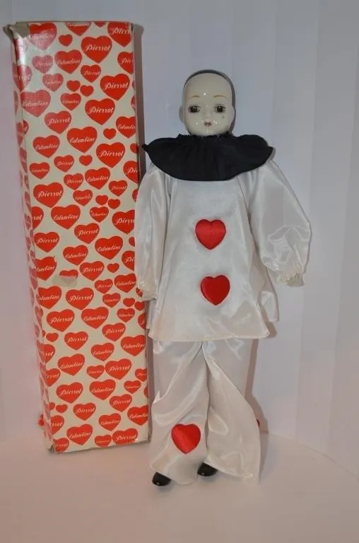 Porcelain Pierrot clown doll, resembling classic