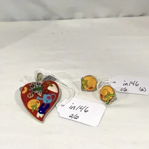 Pendant/pin and pierced earrings