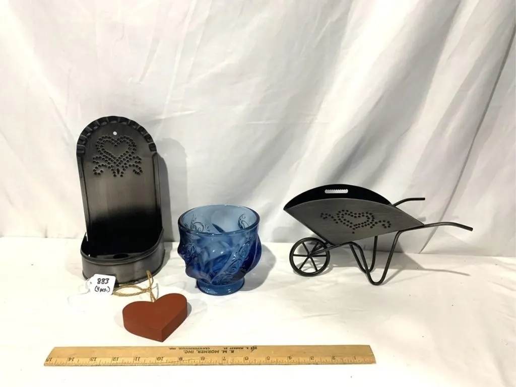 Candle holder for wall and wheel barrow